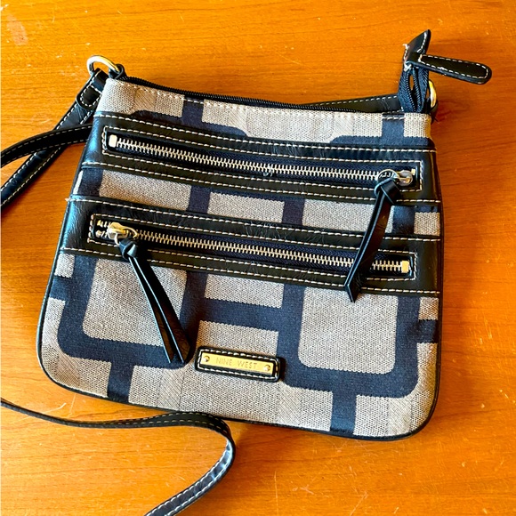 Nine West Crossbody purse in a brown/tan abstract pattern. - Picture 1 of 9